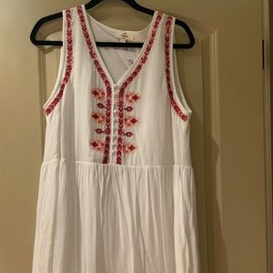 White dress with pink stitching detail